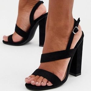 Never worn before black strappy heels